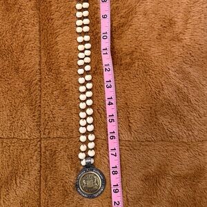 Elegant Cream Beaded Necklace with Silver Pendant